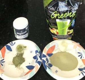 Organifi green juice dosage next to a Total Living Drink dosage