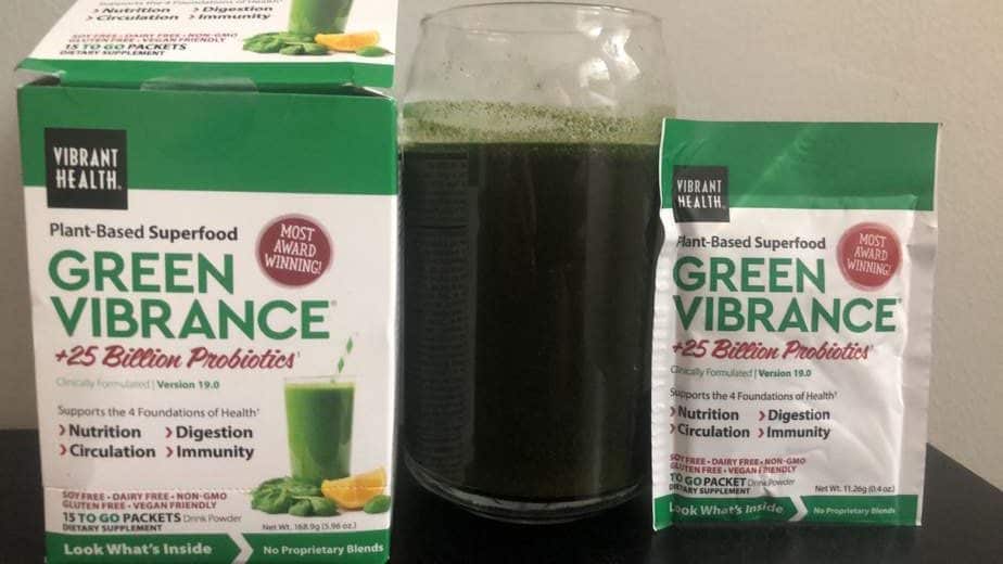 Green vibrance drink next to the box