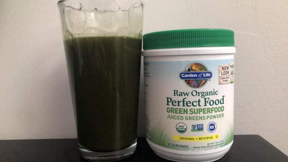 Garden of life green superfood drink next to the jar