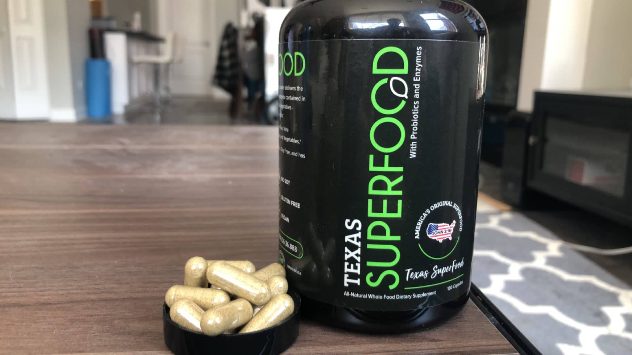 Texas Superfood supplement bottle and capsules
